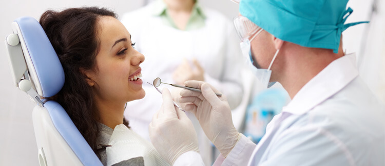 Smiling patient at dentist office