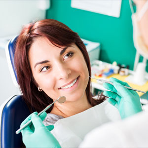 Smiling woman at dentist